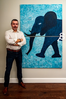 Pasha Simakov with his painting 'Elephant Blues', art by pasha