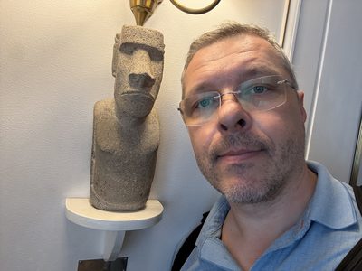 Pasha with an Easter Island Moai aboard the Royal Yacht Britannia, Leith, Scotland, 2026.