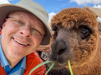 Pasha with alpaca, Peru, 2026.