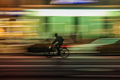 Man on a bicycle at night