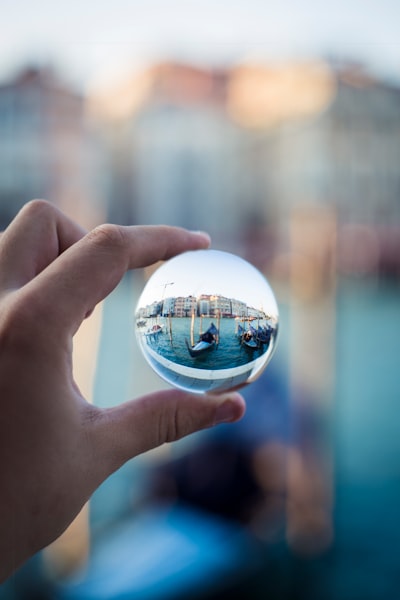 Person holding crystal ball