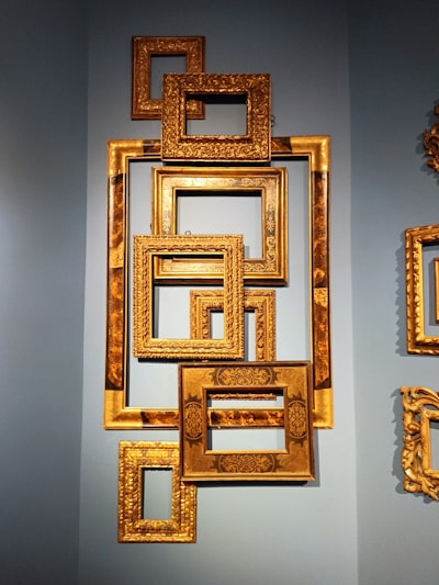 Golden Venetian made frames.