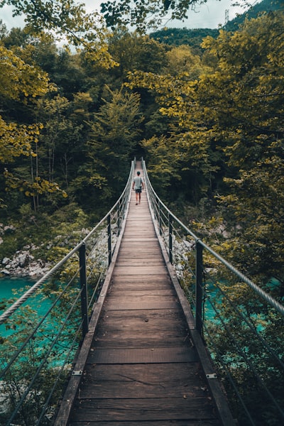 Hiking through some trails in Kobaird, Slovenia we stumbled across this bridge crossing a vivid blue river. Sometimes you just get lucky finding unexpected gems like this.