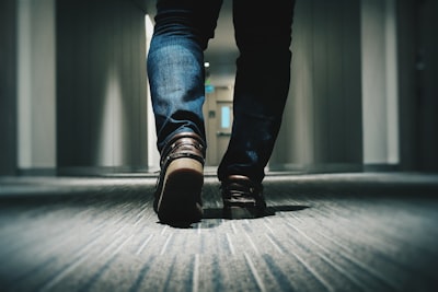 Feet in a hotel corridor