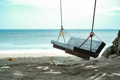 Brown wooden swing seat