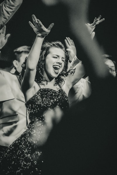(Internation Women’s Day) This young lady was all in for her high school show choir event.  I love the energy and the willingness to just throw herself into the performance 100%.  
The show lights ended up giving this a 1940’s newspaper vibe - which I totally loved and thought made a perfect fit.