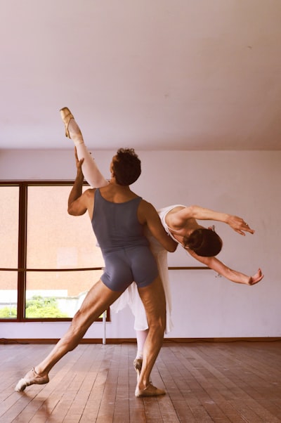 Man and woman dancing inside building