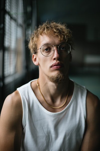 fitness, but make it fashion and add a story

background: shot in my high school's gymnasium, my sister's boyfriend, all natural light, used two lenses (50mm and 100mm)