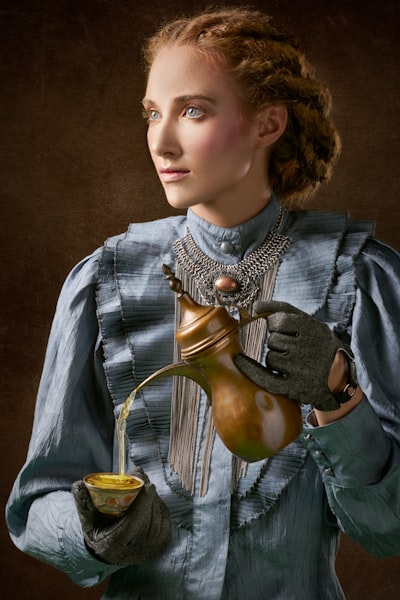 Woman holding turkich teapot