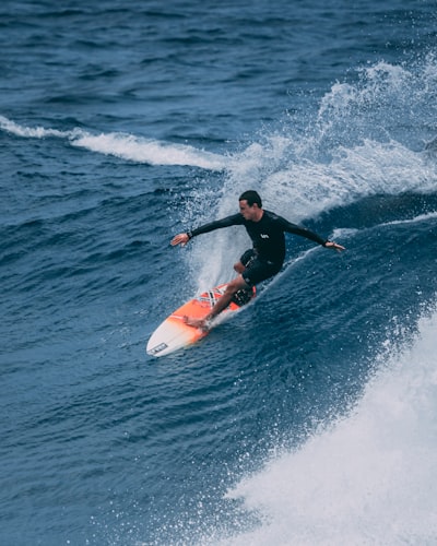 Man surfing on sea waves