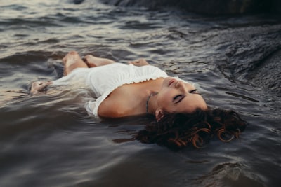 Woman relaxing on body of water