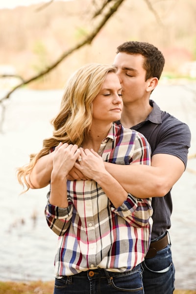 Couple by a lake.