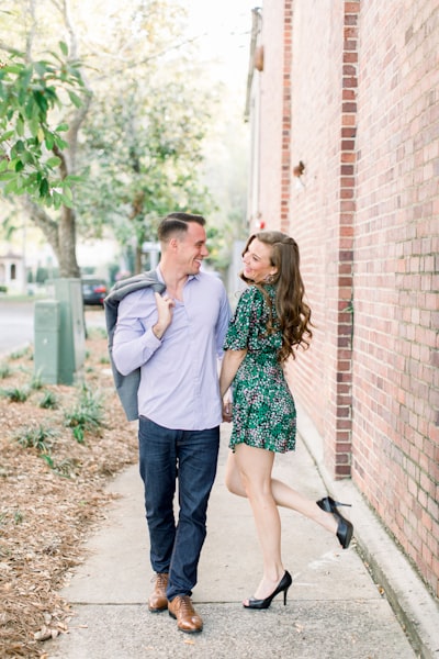 Couple walking, couple laughing, couple smiling at each other, love, couple holding hands, learn more about the models, Alex Sanfilippo and Alecia Sanfilippo @ PodPros.com