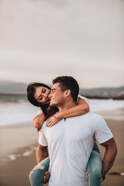 Piggyback ride on the beach