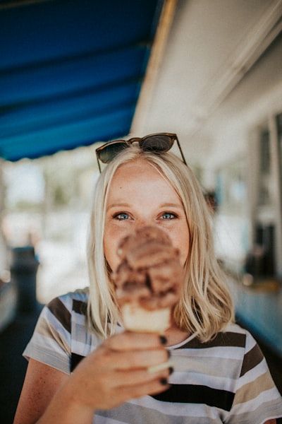 Woman holding chocolate ice cream