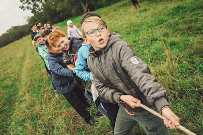These children play the ancient game of tug-of-war. The photo was taken on the day during the festival of children’s creativity. Young actors from different cities of Bashkortostan Republic shared their experience, performed dances and songs.