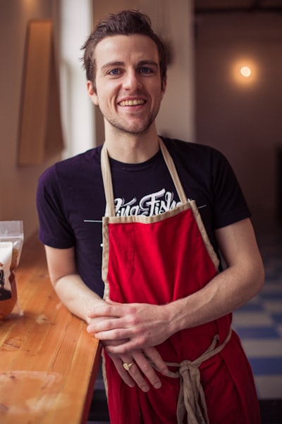 chef in red apron 
