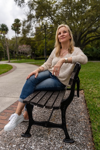 Woman relaxed on park bench