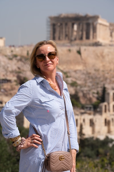 Woman posing with Acropolis in background